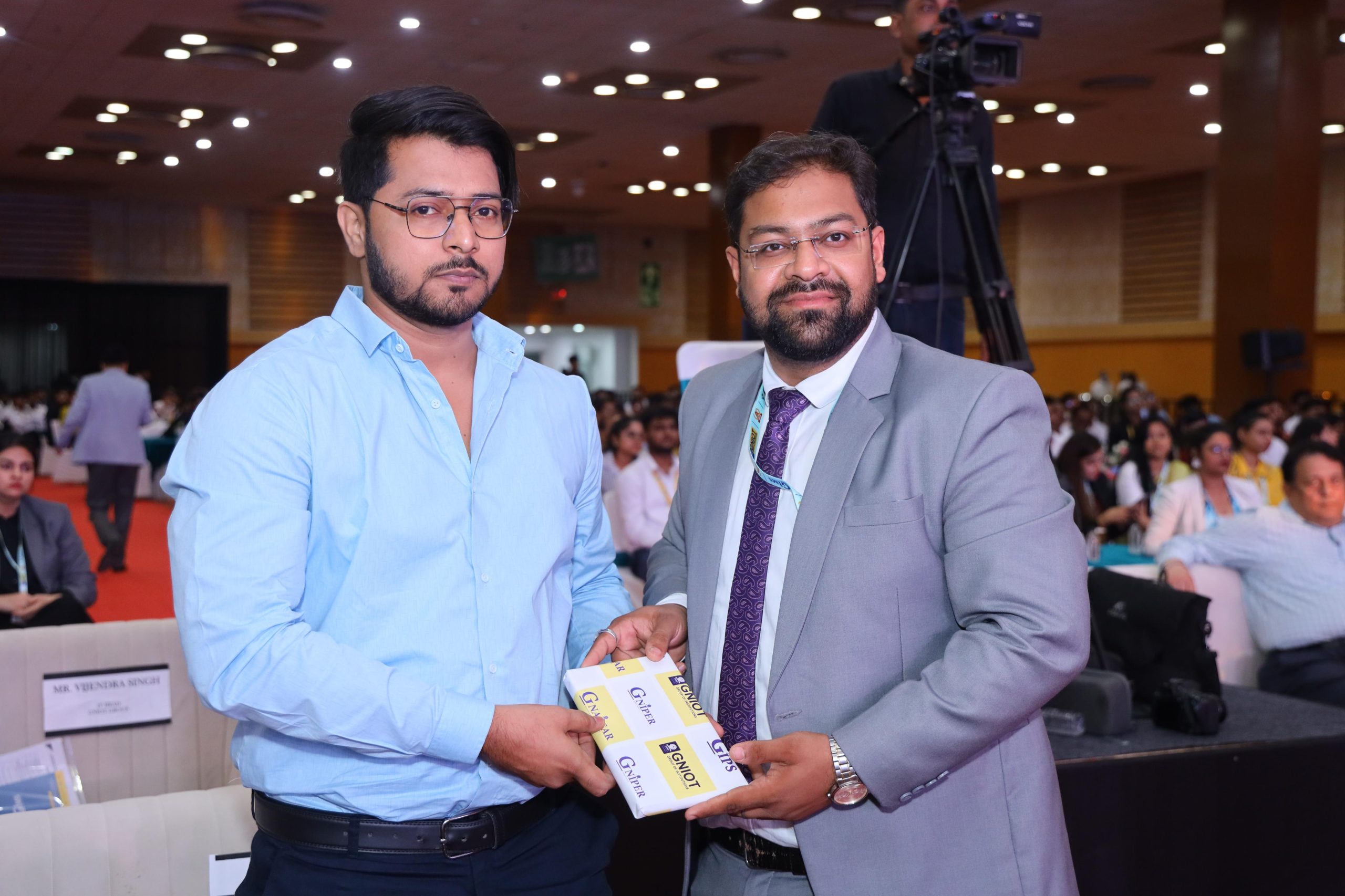 Student receiving award at a counselling event
